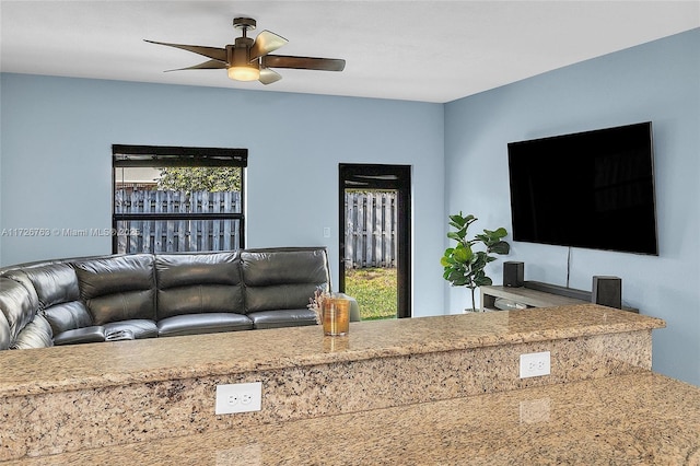 living room featuring ceiling fan