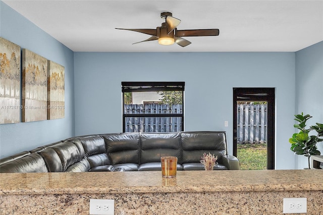 living room with ceiling fan