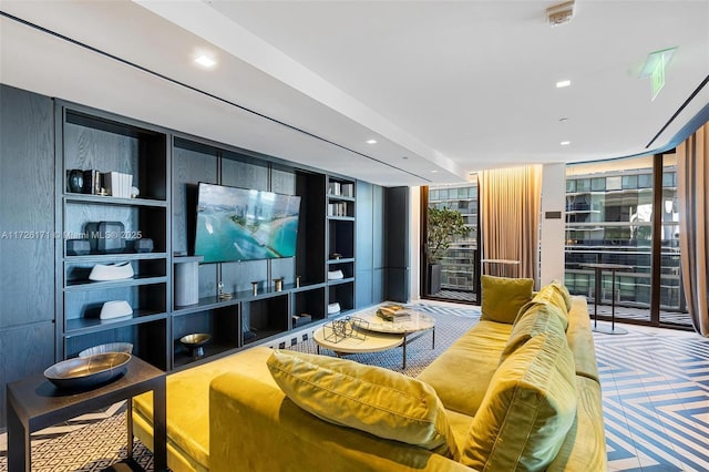cinema room with recessed lighting and built in shelves