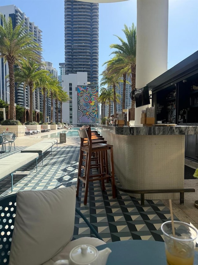 view of patio / terrace featuring a community pool