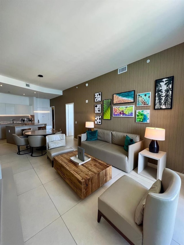 living room with light tile patterned floors