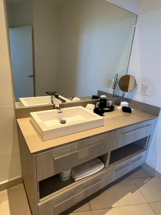 bathroom featuring vanity and tile patterned flooring