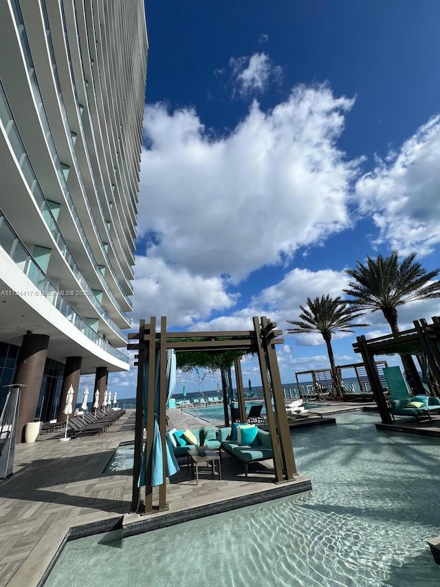 dock area with a patio area and an outdoor hangout area