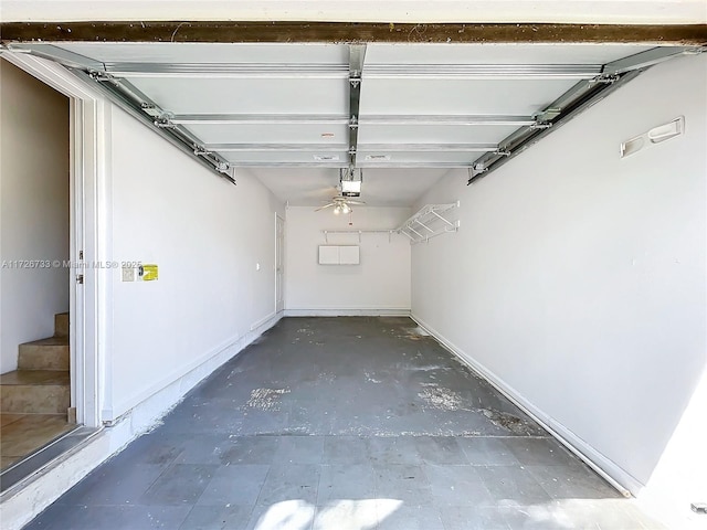 garage featuring ceiling fan and a garage door opener