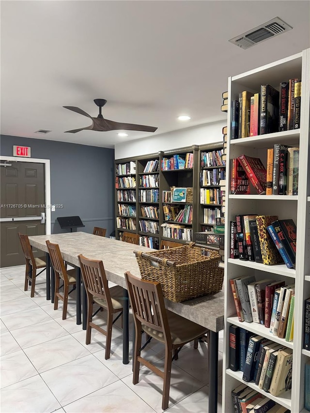 dining space with ceiling fan