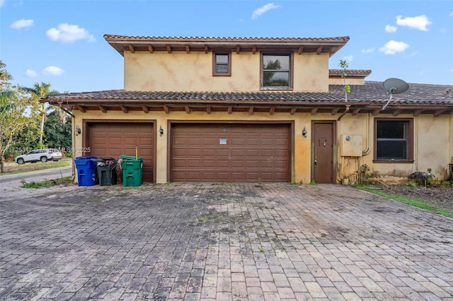 view of front of property featuring a garage