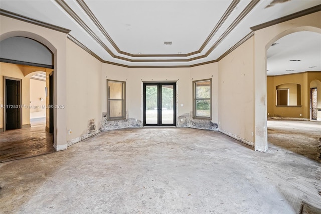 spare room with french doors and ornamental molding