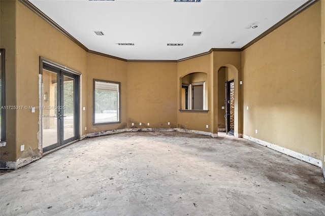 spare room featuring crown molding