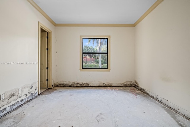 unfurnished room with ornamental molding