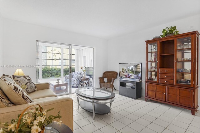 living room featuring light tile patterned flooring