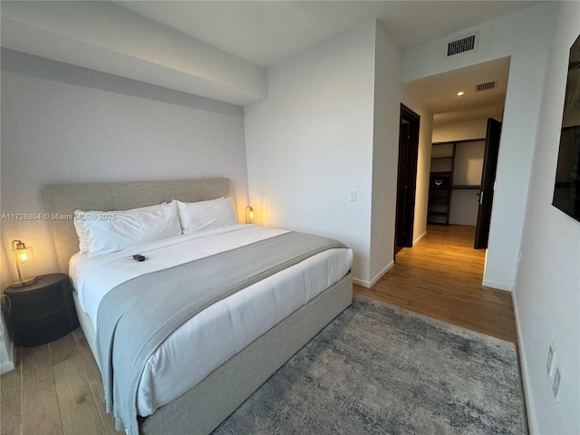 bedroom with light wood-type flooring