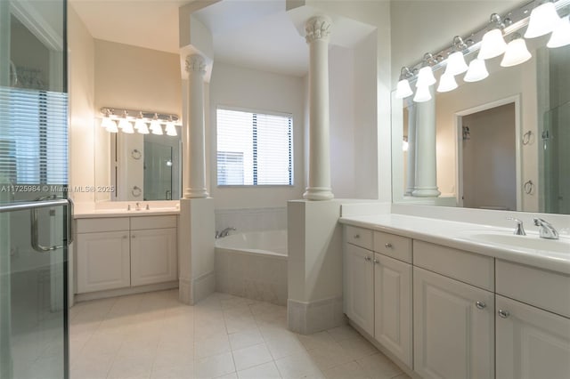 bathroom with shower with separate bathtub, vanity, and tile patterned floors