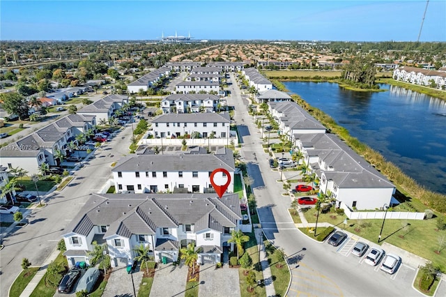 drone / aerial view with a water view