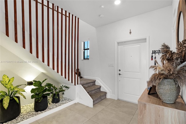 entrance foyer featuring light tile patterned flooring