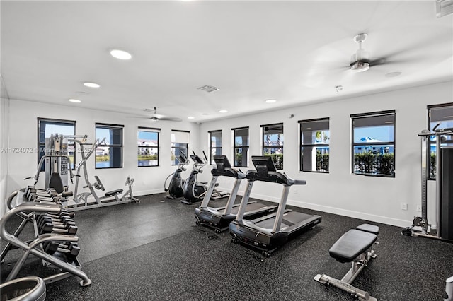 workout area with ceiling fan