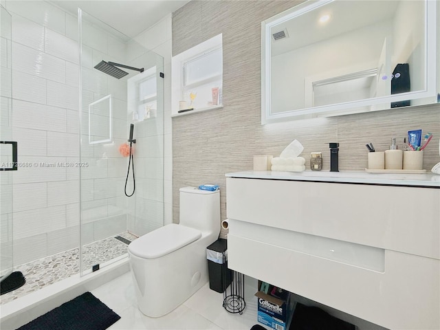 bathroom with tile patterned flooring, a shower with shower door, toilet, backsplash, and vanity