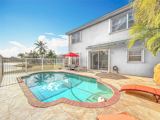 view of pool featuring a patio