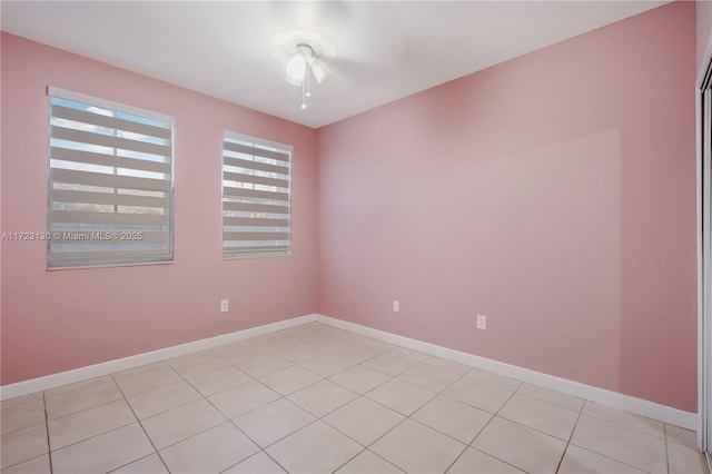 empty room featuring light tile patterned floors