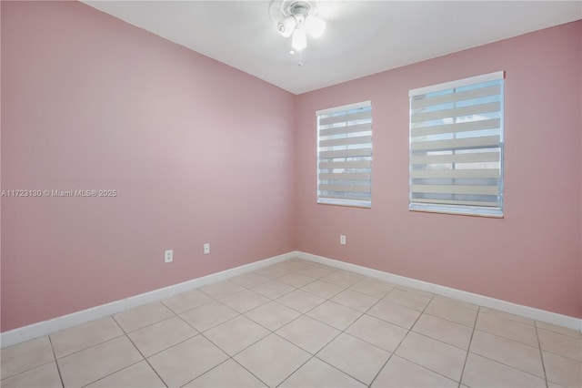 empty room with light tile patterned flooring