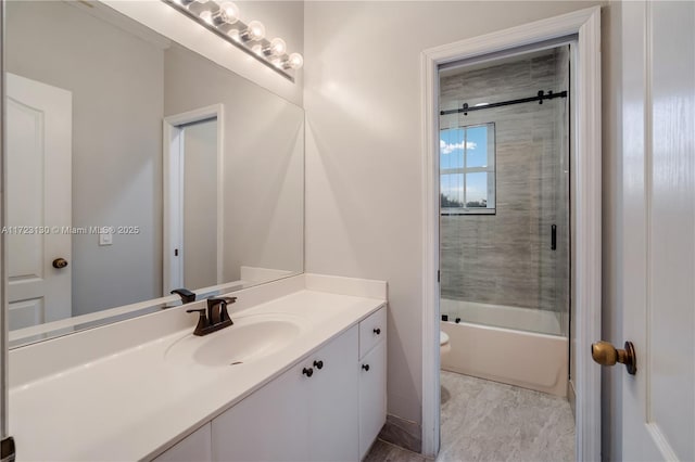 full bathroom with vanity, shower / bath combination with glass door, and toilet