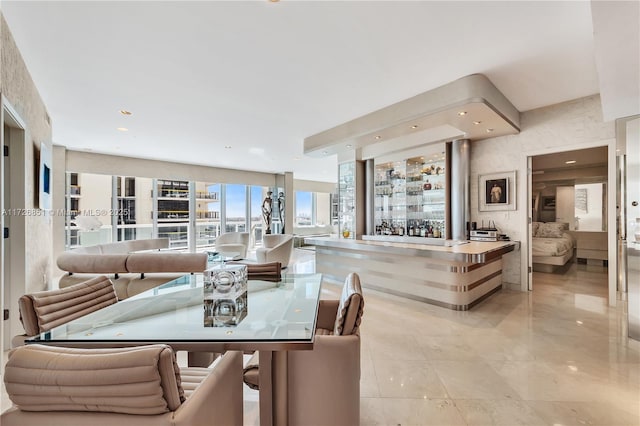 dining area featuring indoor bar