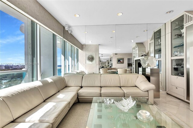 10101 Collins Ave Unit 11Dcaba, Bal Harbour, FL 33154 - living room with a healthy amount of sunlight