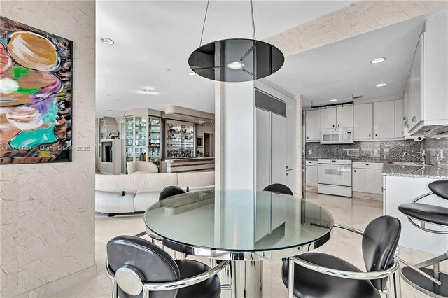 10101 Collins Ave Unit 11Dcaba, Bal Harbour, FL 33154 - dining space with sink