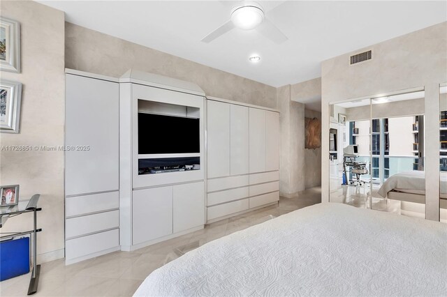 bedroom featuring a closet and ceiling fan