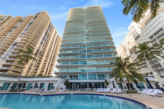 view of swimming pool with a patio area