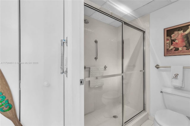 bathroom with toilet and walk in shower