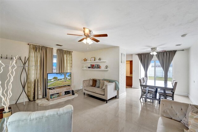 living room with light tile patterned floors