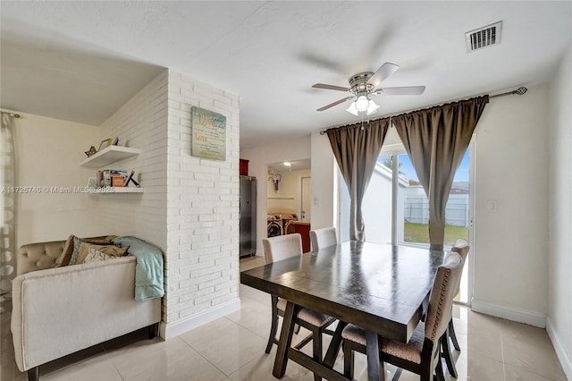 living room with ceiling fan and a healthy amount of sunlight