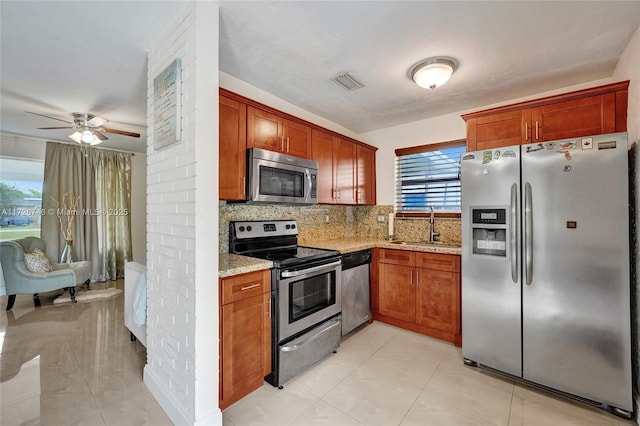 tiled dining room featuring ceiling fan