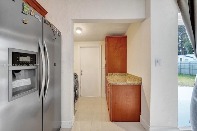 kitchen featuring light stone countertops, appliances with stainless steel finishes, tasteful backsplash, sink, and ceiling fan