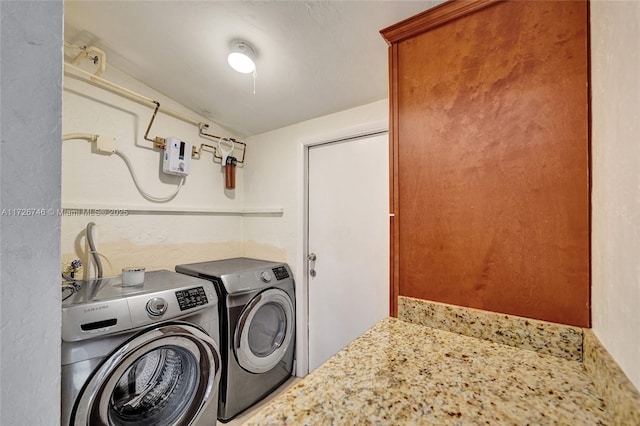 kitchen featuring light stone countertops, appliances with stainless steel finishes, decorative backsplash, sink, and light tile patterned floors