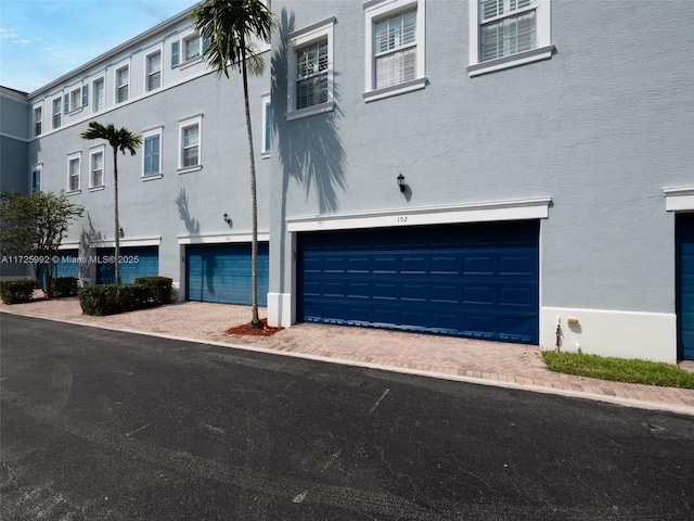 exterior space with a garage