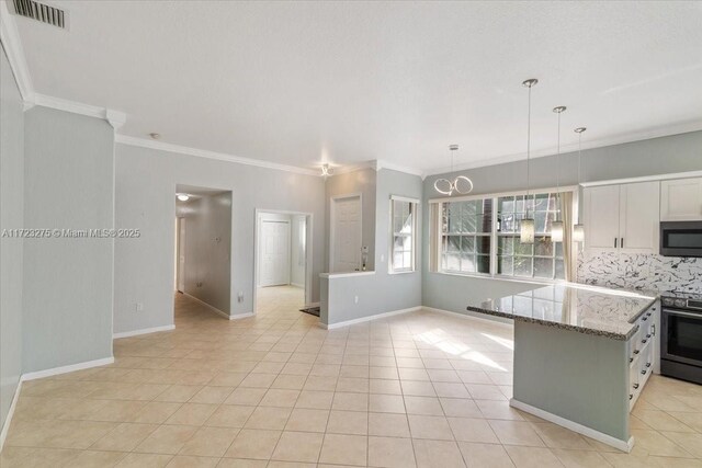 kitchen featuring tasteful backsplash, light tile patterned flooring, light stone countertops, visible vents, and electric stove