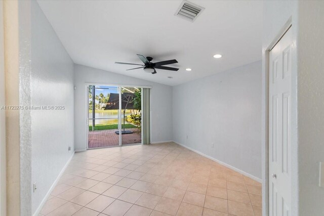 spare room with visible vents, baseboards, a ceiling fan, recessed lighting, and vaulted ceiling