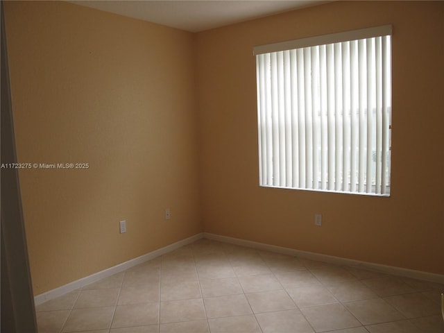 view of tiled spare room