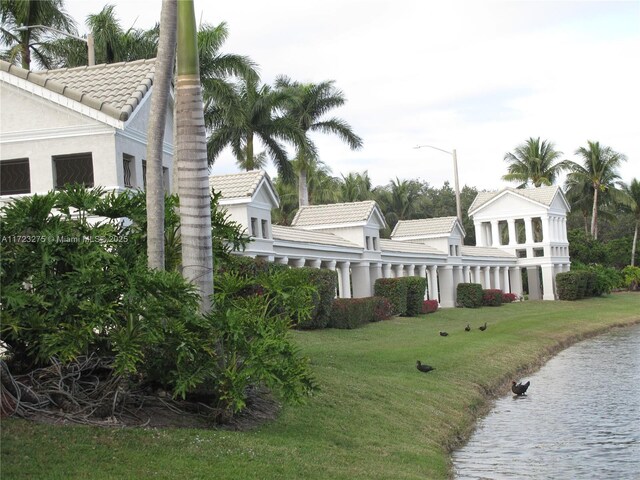 view of patio with a water view