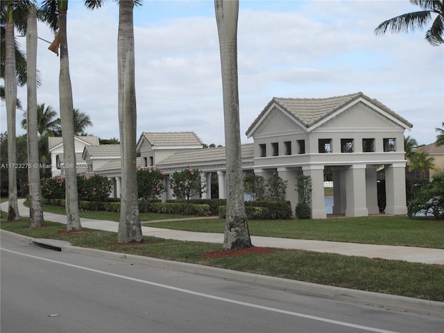 view of front of home with a front lawn