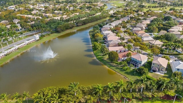 bird's eye view with a water view and a residential view