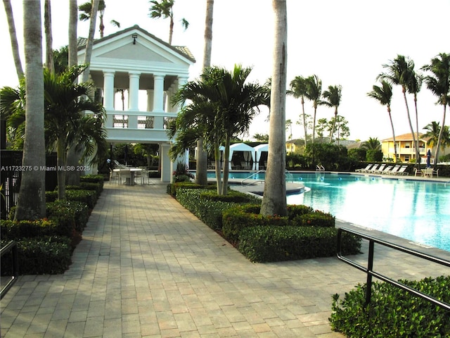 view of pool featuring a patio area