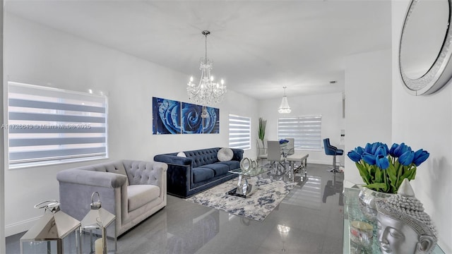 living room with a notable chandelier