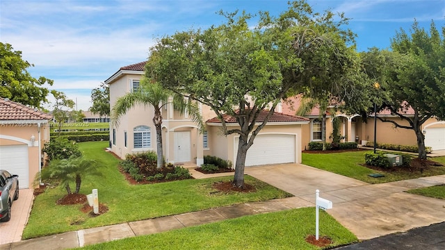 mediterranean / spanish-style house featuring a front lawn