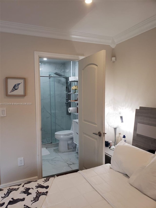 bedroom featuring ensuite bath and ornamental molding