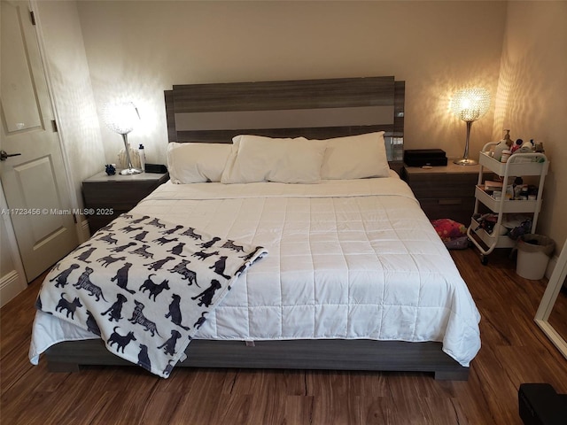 bedroom with wood-type flooring