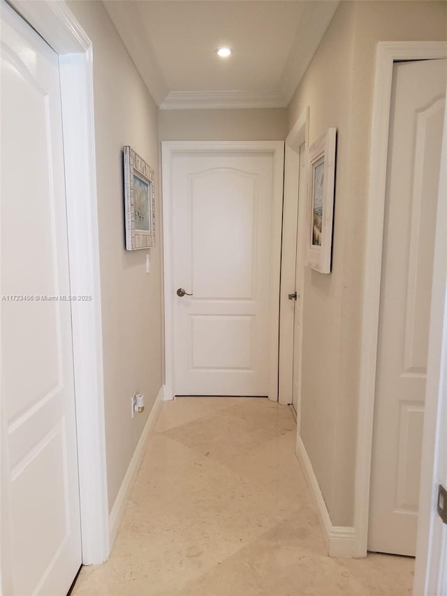 hallway featuring crown molding