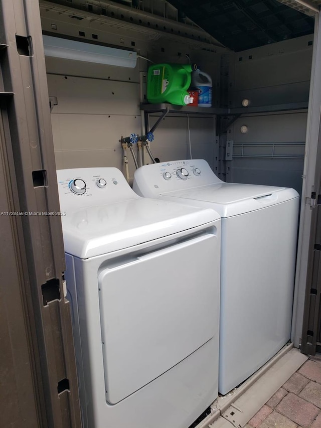 laundry area featuring washer and clothes dryer