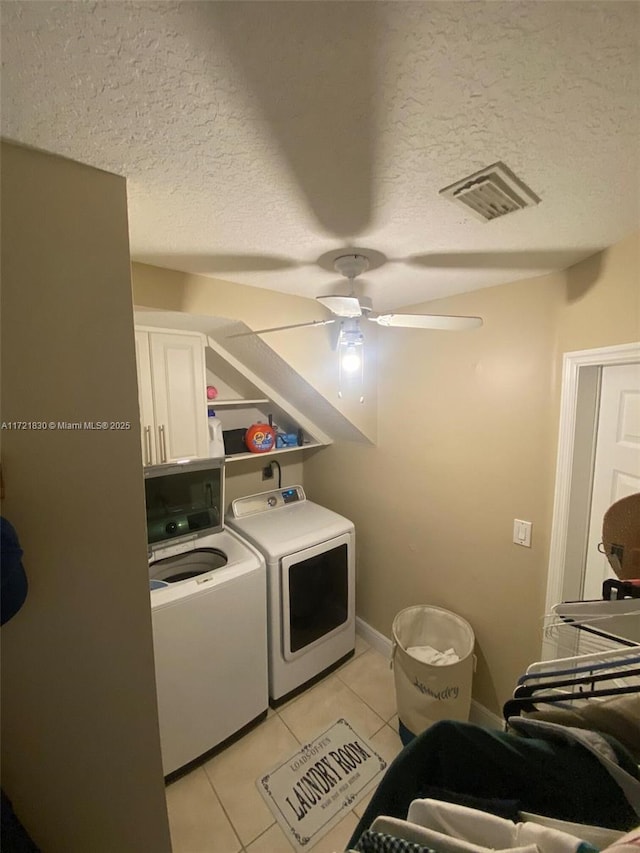 16445 SW 100th Ter, Miami, FL 33196 - washroom featuring cabinets, light tile patterned floors, independent washer and dryer, and a textured ceiling